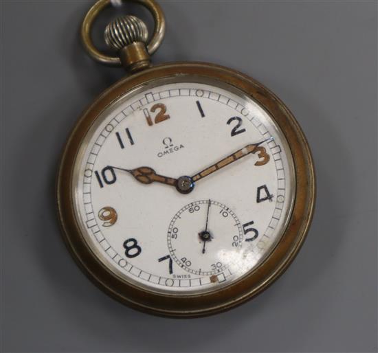 An Omega nickel? cased keyless open faced pocket watch, the case back inscribed G.S.T.P. F032340 below broad arrow.